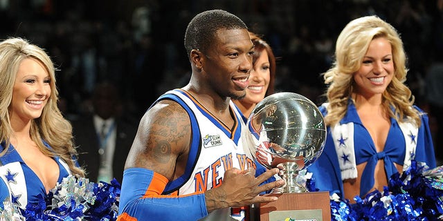 Nate Robinson of the New York Knicks poses with his trophy after winning the Sprite Slam Dunk Contest as part of All-Star Saturday Night during 2010 NBA All Star Weekend Feb. 13, 2010, at the American Airlines Center in Dallas. 