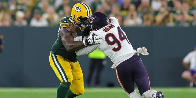 Yosh Nijman of the Green Bay Packers, left, works against Robert Quinn (94) of the Chicago Bears during a game at Lambeau Field Sept. 18, 2022, in Green Bay, Wis.  