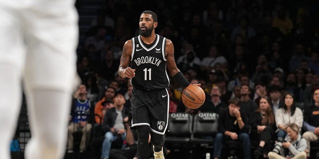 Kyrie Irving of the Brooklyn Nets dribbles during a game against the Dallas Mavericks Oct. 27, 2022, at Barclays Center in Brooklyn. 