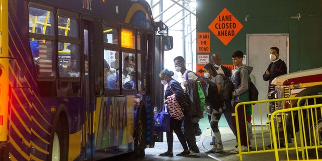 Migrants leave for a shelter from the Port Authority bus terminal in New York, the United States, on Sept. 27, 2022.