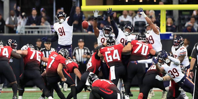 Atlanta Falcons place kicker Younghoe Koo (7) kicks a field goal to tie the game at the conclusion of the 1st half during the Sunday afternoon NFL game between the Chicago Bears and the Atlanta Falcons on November 20, 2022 at Mercedes-Benz Stadium in Atlanta, Georgia.  