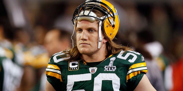 A.J. Hawk #50 of the Green Bay Packers looks on from the sideline against the Pittsburgh Steelers during Super Bowl XLV at Cowboys Stadium on Feb. 6, 2011 in Arlington, Texas. The Packers won 31-25.