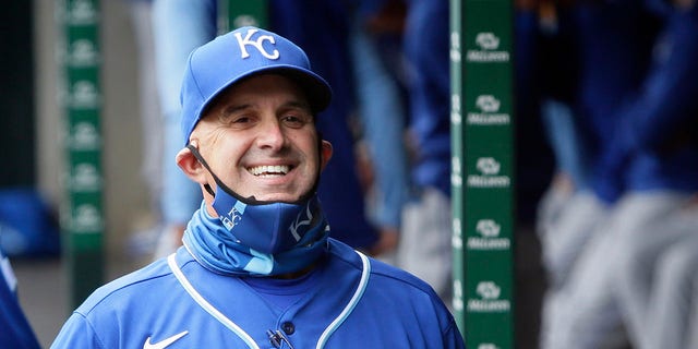 Pedro Grifol of the Kansas City Royals smiles in the dugout before a game against the Tigers at Comerica Park on April 24, 2021, in Detroit.