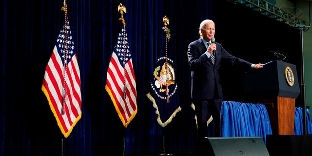 "I love those signs when I came in," Biden said. "Socialism. Give me a break, what idiots." (AP Photo/Patrick Semansky)
