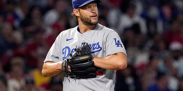 Los Angeles Dodgers starting pitcher Clayton Kershaw looks toward the outfield after giving up a double to the Los Angeles Angels' Luis Rengifo during the eighth inning of a game July 15, 2022, in Anaheim, Calif.