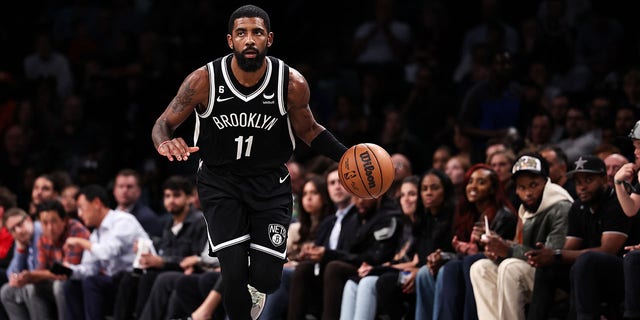 Kyrie Irving of the Brooklyn Nets brings the ball up the court during the third quarter of a game against the Chicago Bulls at Barclays Center Nov. 1, 2022, in New York City. 