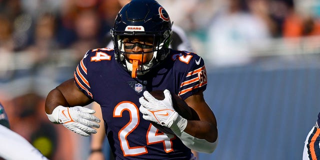 Khalil Herbert of the Chicago Bears runs the ball during the first half in a game against the Miami Dolphins at Soldier Field Nov. 6, 2022, in Chicago.