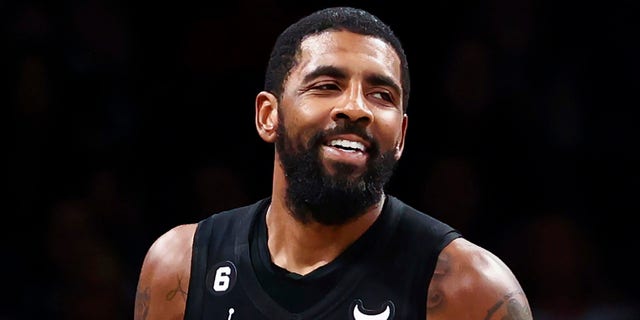 Brooklyn Nets guard Kyrie Irving after scoring a basket against the Indiana Pacers, Monday, Oct. 31, 2022, in New York.