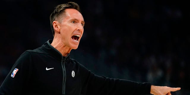 Brooklyn Nets head coach Steve Nash argues a call during the first half of an NBA basketball game Wednesday, Oct. 26, 2022, in Milwaukee. 