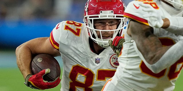Travis Kelce, #87 of the Kansas City Chiefs, runs the ball after a catch during the second half in the game against the Los Angles Chargers at SoFi Stadium on Nov. 20, 2022 in Inglewood, California. 