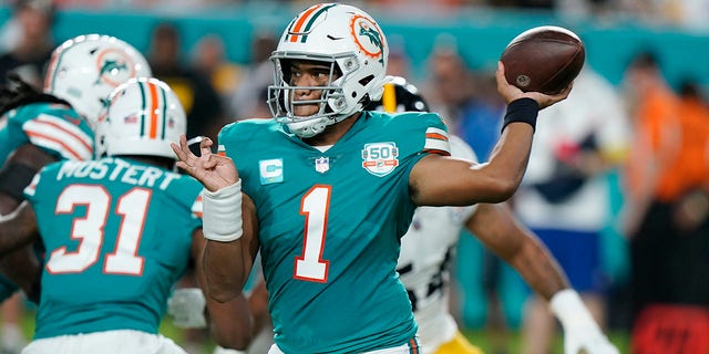 Miami Dolphins quarterback Tua Tagovailoa (1) throws a pass during the first half of a game against the Pittsburgh Steelers Oct. 23, 2022, in Miami Gardens, Fla. 
