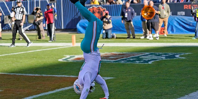 Miami Dolphins wide receiver Tyreek Hill celebrates a touchdown during the first half against the Chicago Bears, Nov. 6, 2022, in Chicago.