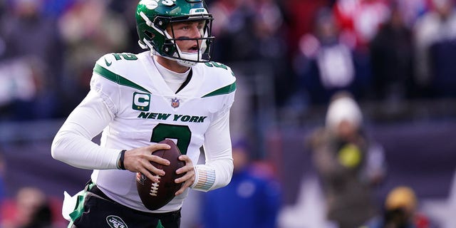 Nov 20, 2022; Foxborough, Massachusetts, USA; New York Jets quarterback Zach Wilson (2) looks to pass against the New England Patriots in the first quarter at Gillette Stadium.
