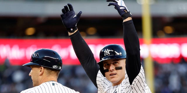 Anthony Rizzo of the New York Yankees reacts after hitting an RBI single against the Cleveland Guardians during the fifth inning in Game 5 of an American League Division Series at Yankee Stadium Oct. 18, 2022, in New York, N.Y. 