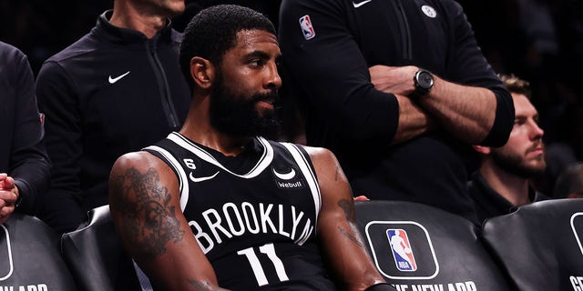 Kyrie Irving of the Brooklyn Nets sits on the bench during the game against the Chicago Bulls at Barclays Center, Nov. 1, 2022, in New York City.