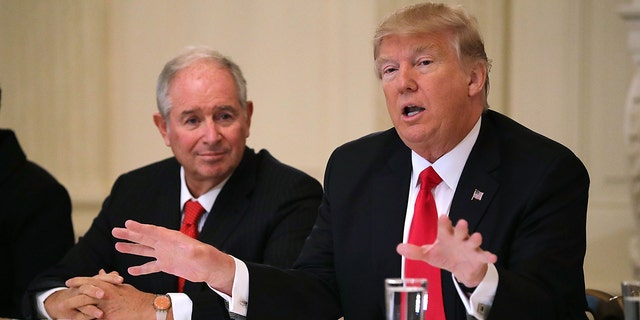 Trump delivers opening remarks at the beginning of a policy forum with business leaders chaired by Blackstone Group CEO Stephen Schwarzman in the State Dining Room at the White House on February 3, 2017, in Washington, DC.
