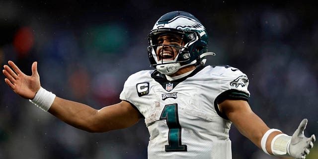 Philadelphia Eagles quarterback Jalen Hurts (1) reacts after a touchdown against the New York Giants during an NFL football game Sunday, Dec. 11, 2022, in East Rutherford, N.J.