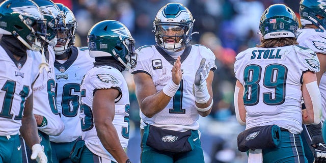 Philadelphia Eagles quarterback Jalen Hurts (1) leads a huddle during a game against the Chicago Bears Dec. 18, 2022, at Soldier Field in Chicago. 