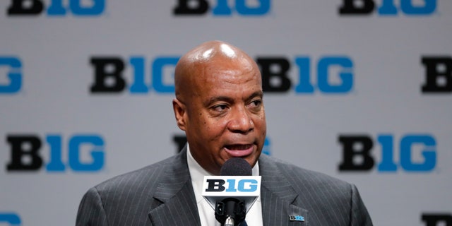 FILE - In this March 12, 2020, file photo, Big Ten Commissioner Kevin Warren addresses the media in Indianapolis. The Big Ten’s plan to play football this fall includes trying to save lives in the future. The conference announced Wednesday, Sept. 16, 2020, it would have a football season this fall. The Big Ten is setting up a cardiac registry to study the effects COVID-19 has on student-athletes' hearts. Big Ten Commissioner Kevin Warren said it will help all students, surrounding communities, and the entire nation. 