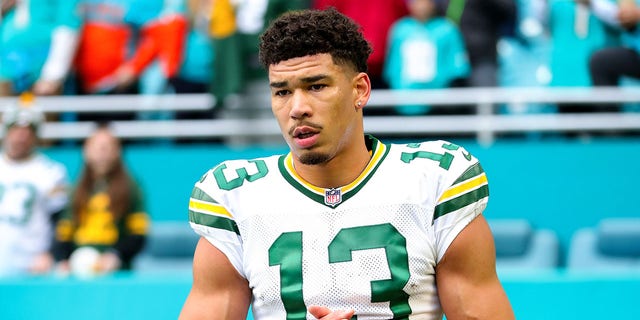 Allen Lazard #13 of the Green Bay Packers looks on at halftime against the Miami Dolphins at Hard Rock Stadium on December 25, 2022 in Miami Gardens, Florida.