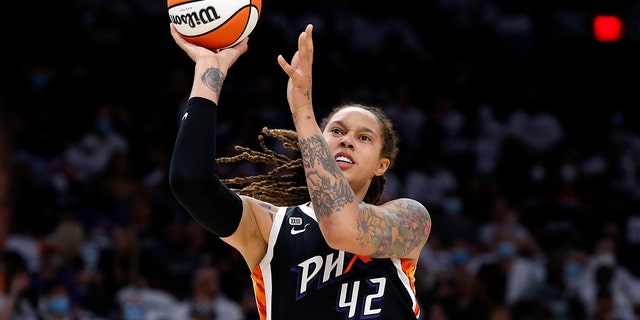 FILE - Phoenix Mercury center Brittney Griner shoots during the first half of Game 1 of the WNBA basketball Finals against the Chicago Sky, on Oct. 10, 2021, in Phoenix.