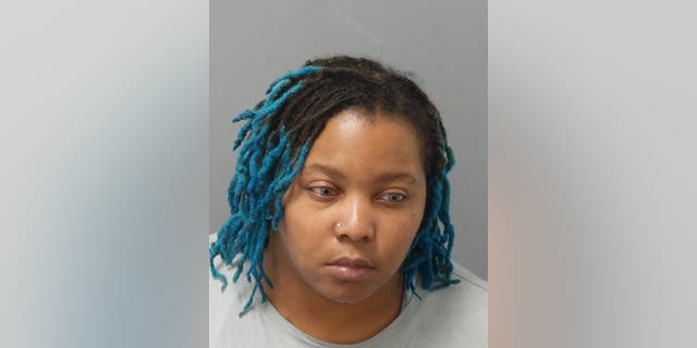 Demesha Coleman, 35, in a booking photo provided by the St. Louis Metro Police. Colemand is charged with two counts of Murder 1st degree, one count of Assault 1st degree, and three counts of Armed Criminal Action.