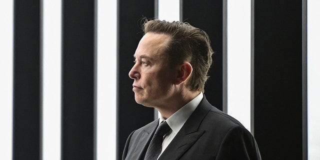 Tesla CEO Elon Musk is pictured as he attends the start of the production at Tesla's "Gigafactory" on March 22, 2022 in Gruenheide, southeast of Berlin. 