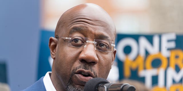 Sen. Raphael Warnock, D-Ga., speaks at a press conference to discuss his runoff campaign on Nov. 10, 2022, in Atlanta.