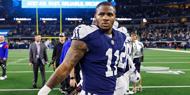 Micah Parsons, #11 of the Dallas Cowboys, walks off the field after a game against the New York Giants at AT&amp;T Stadium on November 24, 2022, in Arlington, Texas. The Cowboys defeated the Giants 28-20. 