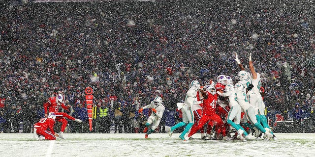 Tyler Bass, #2 of the Buffalo Bills, kicks the game winning field goal against the Miami Dolphins at Highmark Stadium on Dec. 17, 2022 in Orchard Park, New York. 