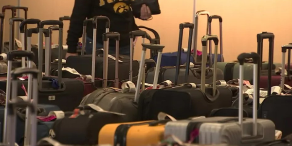 Thousands of bags pile up in airports’ baggage claims after Christmas delays