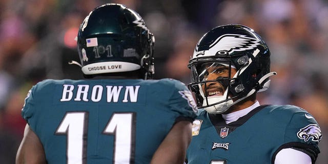 Jalen Hurts #1 and A.J. Brown #11 of the Philadelphia Eagles react against the Washington Commanders at Lincoln Financial Field on November 14, 2022 in Philadelphia, Pennsylvania.
