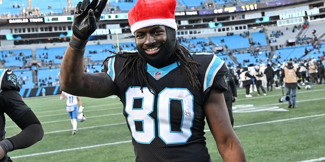 Ian Thomas #80 of the Carolina Panthers reacts after defeating the Detroit Lions at Bank of America Stadium on December 24, 2022, in Charlotte, North Carolina. 