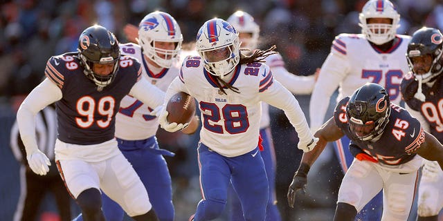 James Cook #28 of the Buffalo Bills rushes for a touchdown against the Chicago Bears during the third quarter of the game at Soldier Field on Dec. 24, 2022 in Chicago, Ill. 