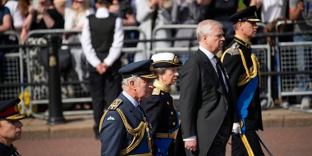 Britain's King Charles III, Princess Anne , Prince Andrew and Prince Edward follow the coffin of Queen Elizabeth II during a procession from Buckingham Palace to Westminster Hall. 