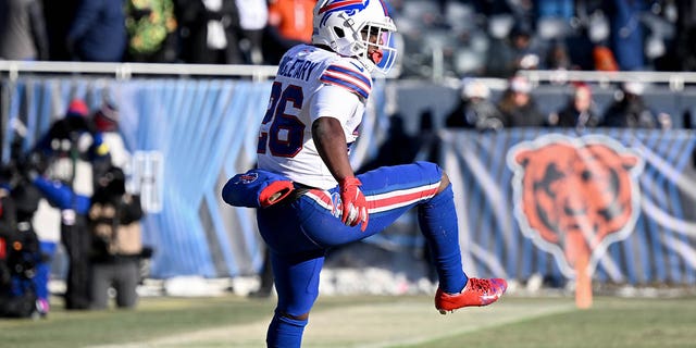 Devin Singletary #26 of the Buffalo Bills celebrates after a touchdown during the third quarter in the game against the Chicago Bears at Soldier Field on Dec. 24, 2022 in Chicago, Ill.