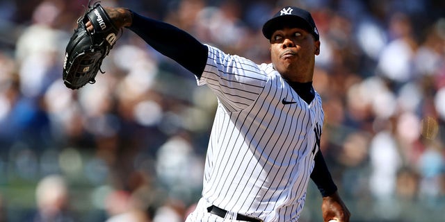 Aroldis Chapman #54 of the New York Yankees in action against the Kansas City Royals during a game at Yankee Stadium on July 30, 2022, in New York City.