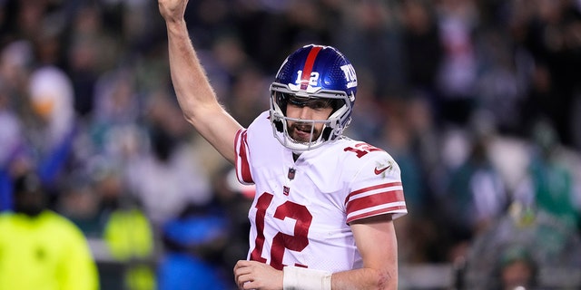 New York Giants quarterback Davis Webb gestures after scoring a touchdown run against the Philadelphia Eagles during the second half of an NFL football game, Sunday, Jan. 8, 2023, in Philadelphia. 