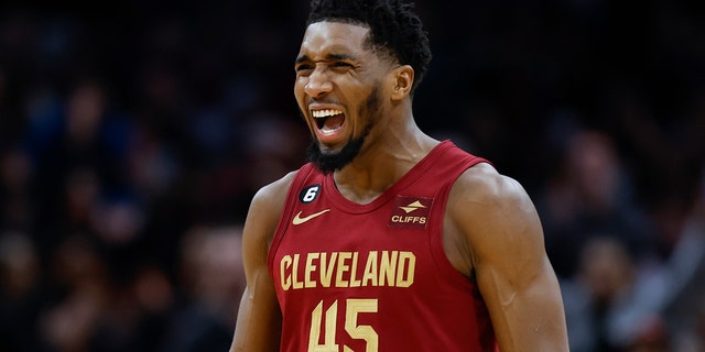 Cleveland Cavaliers guard Donovan Mitchell celebrates after making a 3-point basket against the Indiana Pacers during the second half of an NBA basketball game, Friday, Dec. 16, 2022, in Cleveland. 