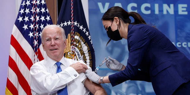 U.S. President Joe Biden receives his updated COVID-19 booster in the South Court Auditorium at the White House campus on October 25, 2022 in Washington, DC. Biden delivered remarks on the status of Covid-19 in the United States. 