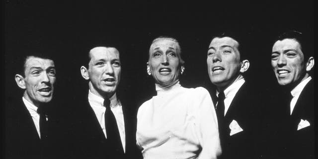 Singer Kay Thompson and the quartet formed the popular nightclub act Kay Thompson and The Williams Brothers. 