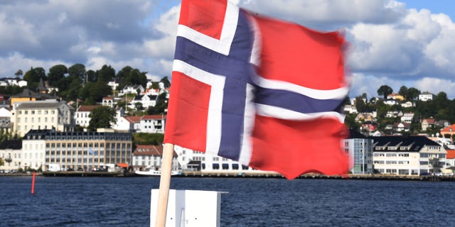 Norwegian flag in the Sogne Harbour, southern Norway in August 22nd 2017.