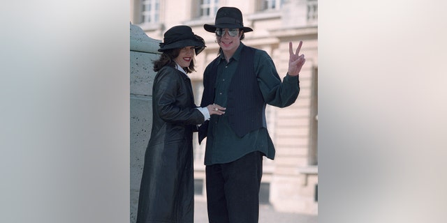 Michael Jackson and wife Lisa Marie Presley in 1995 at Versailles, France. 
