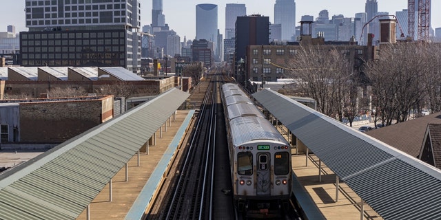 A CTA Green Line train heads east to the Chicago Loop from the Ashland station Monday, March 8, 2021. 