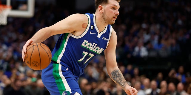 Luka Doncic of the Mavericks dribbles the ball against the New York Knicks at American Airlines Center on Dec. 27, 2022, in Dallas, Texas.