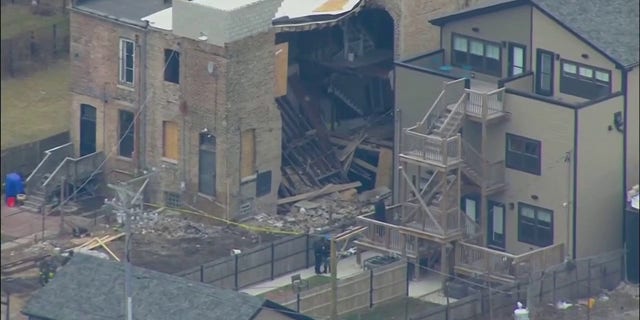 A Chicago building collapse trapped a man, who was freed from debris by firefighters but remains in grave condition, Thursday, Jan. 12, 2023.