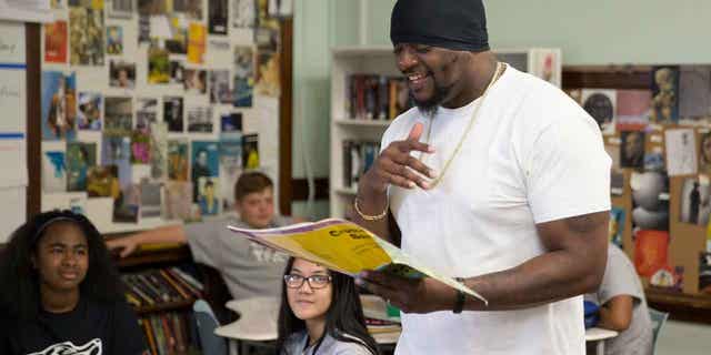 Community activist Will Keeps works with students at Harding Middle School on Sept. 27, 2017, in Des Moines, Iowa. Keeps is hospitalized in serious condition after surgery following a shooting that killed two teenagers at the Starts Right Here educational program he founded in Des Moines. 