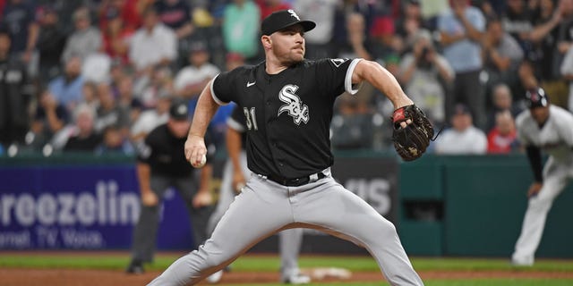 Liam Hendriks #31 of the Chicago White Sox throws a pitch during the ninth inning against the Cleveland Guardians at Progressive Field on August 20, 2022 in Cleveland.