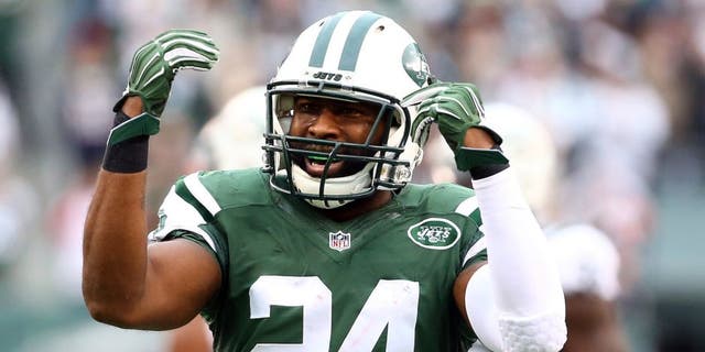 EAST RUTHERFORD, NJ - DECEMBER 27: Darrelle Revis #24 of the New York Jets reacts in the third quarter against the New England Patriots during their game at MetLife Stadium on December 27, 2015, in East Rutherford, New Jersey. 