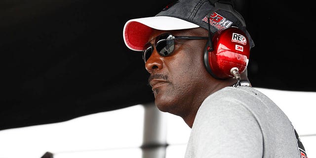 NBA Hall of Famer Michael Jordan and co-owner of 23XI Racing looks on from the 23XI Racing pit box during the NASCAR Cup Series Go Bowling at The Glen at Watkins Glen International on Aug. 8, 2021, in Watkins Glen, New York.